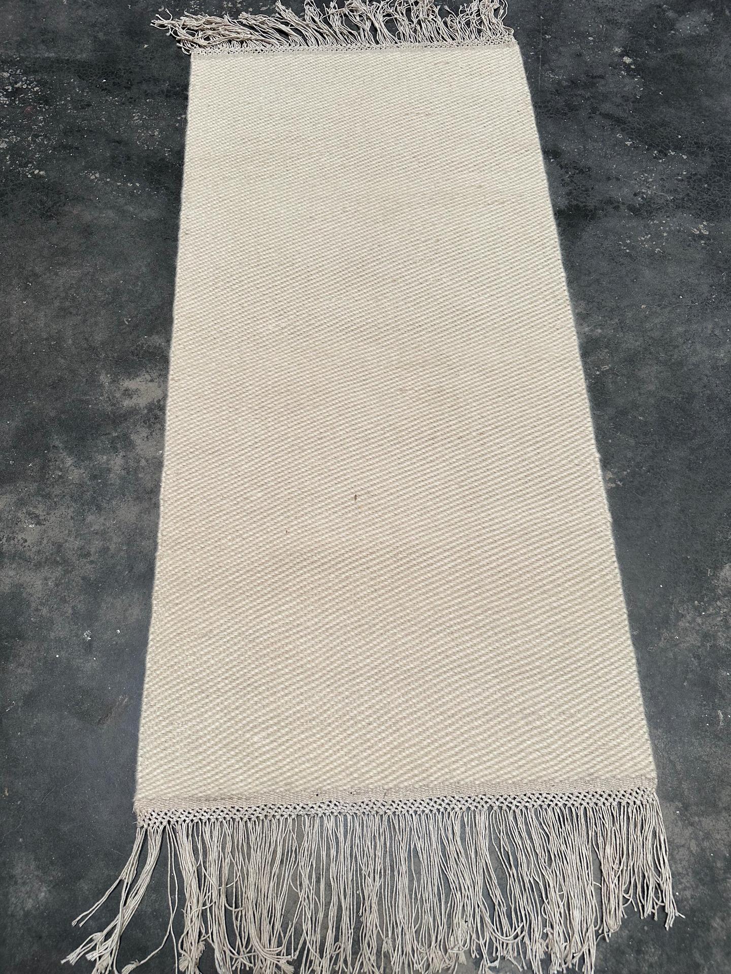 Cashmere flatwoven runner rug in ivory with minimalist Scandinavian design and soft texture
