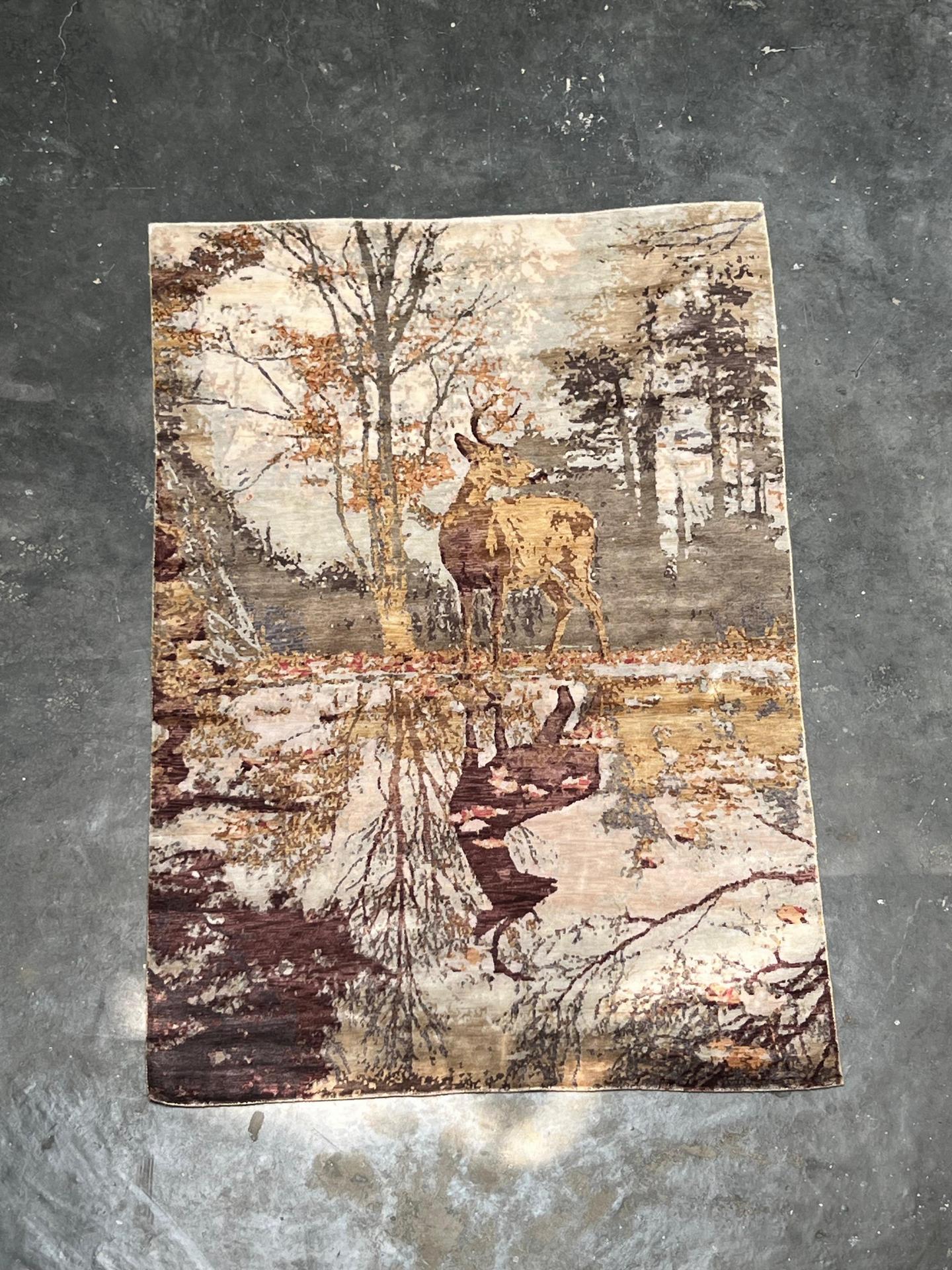 Handknotted bamboo silk rug with stag in autumn forest, pictorial design with nature landscape and reflection